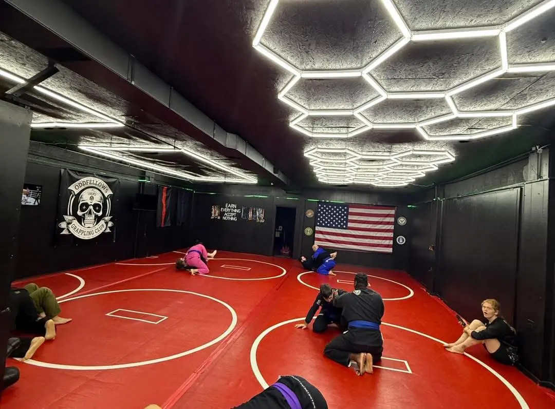 Partners practicing together on the actual Oddfellows red mats